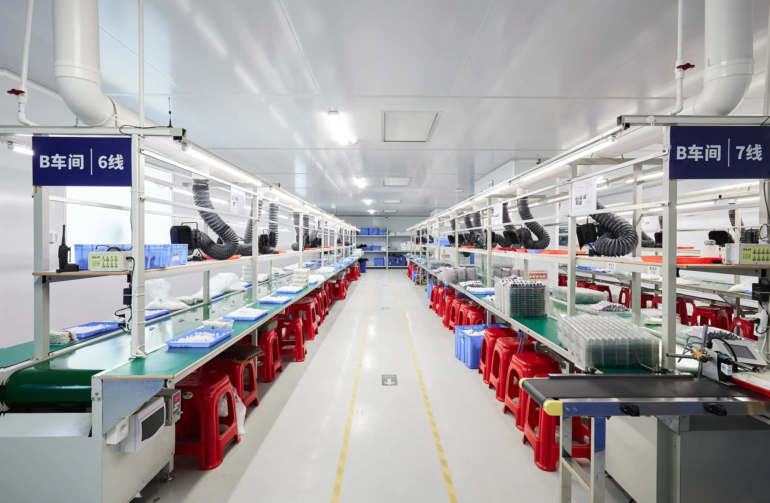 Organized empty vape assembly workstations on production lines 6 and 7 in Workshop B at Vape ODM Factory Dongguan